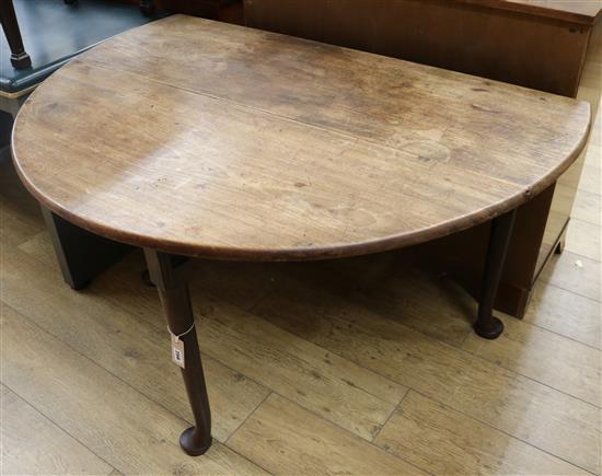 A George III mahogany cottage drop leaf table W.122cm